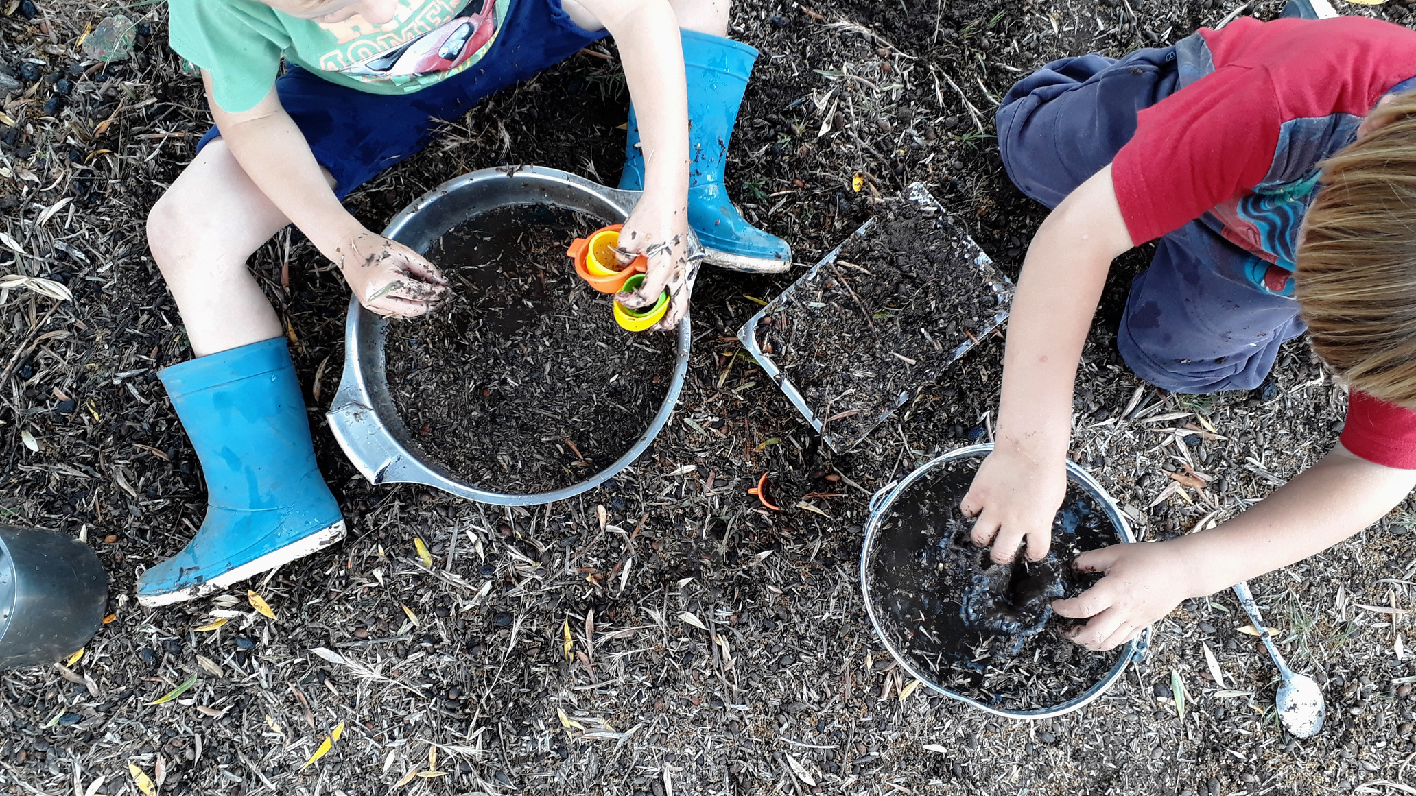 Children Playing with Water Mud and Grass 